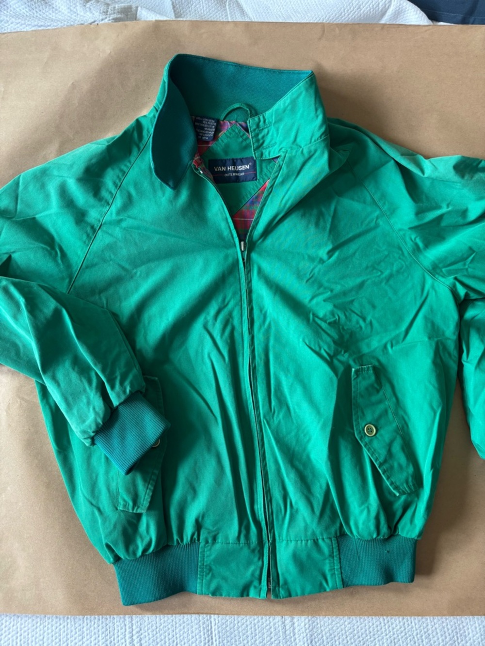 90s Dad Golf Jacket
Kelly Green with red plaid lining by
VanHeusen outerwear